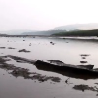 Excavating the Bronze Age logboat from Carpow.